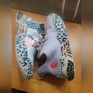 UIN Blue and Purple Athletic Shoes with Distinctive Design